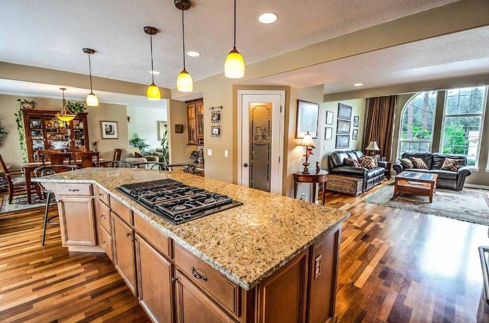 Open-plan living and kitchen area after a full clean